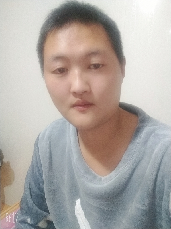 烟圈里透着伤的第一张照片--长乐相亲服务中心